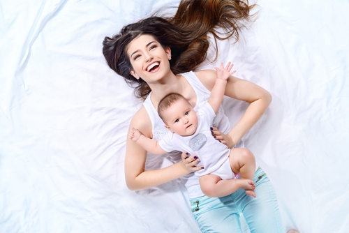 Mother and child smiling after LASIK