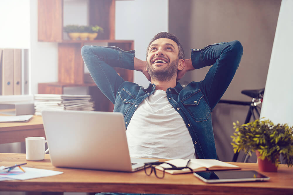 Happy Person on a Laptop