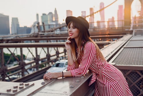 Young woman looking out over NYC