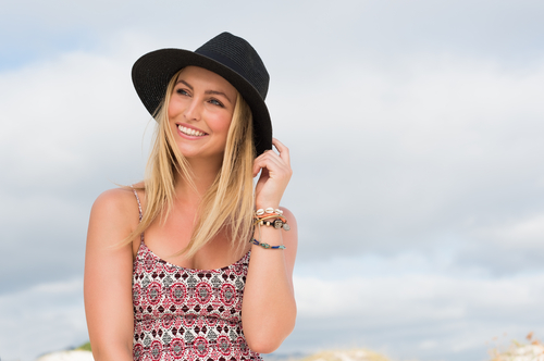 Woman wearing a hat outside