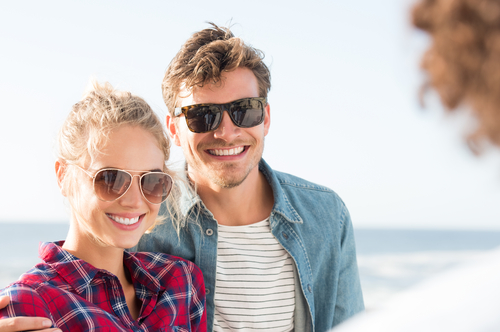 Couple wearing sunglasses outside